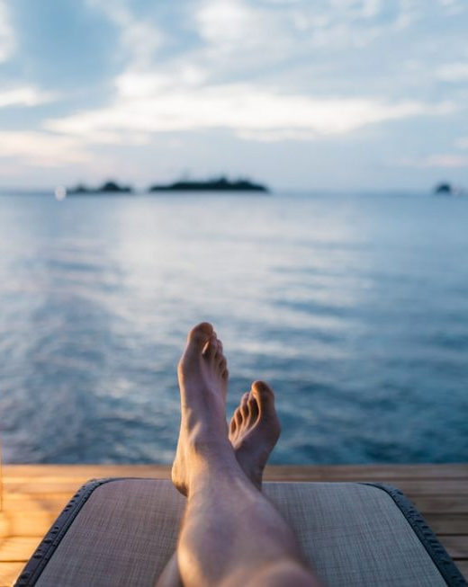 close up legs lantern dock water